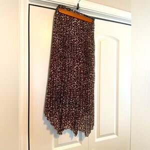 Japna midi skirt with asymmetrical hem and elastic waist, fully lined!